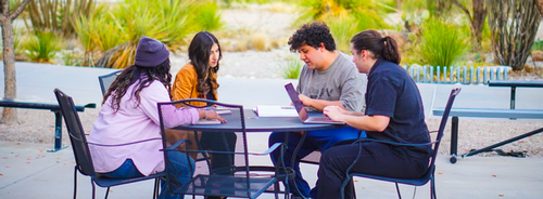 Students sting around the table