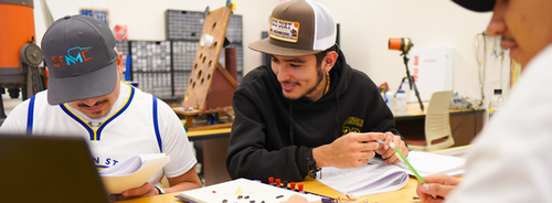 Students in a electronics classroom 