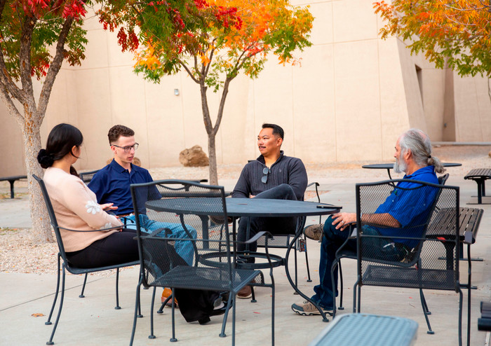Students sitting around a table