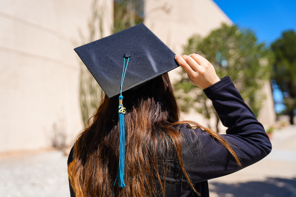 Graduate with cap and gown 